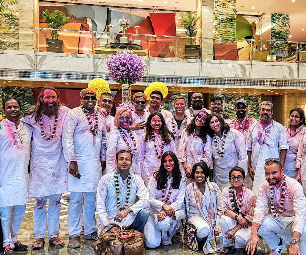 Kellogg students celebrate Holi in India during a Global Initiatives in Management (GIM) trip focused on Tech Ventures. Decked in traditional attire and vibrant colors, the group radiates the spirit of cultural immersion, camaraderie and joyful learning—hallmarks of the Kellogg global experience.