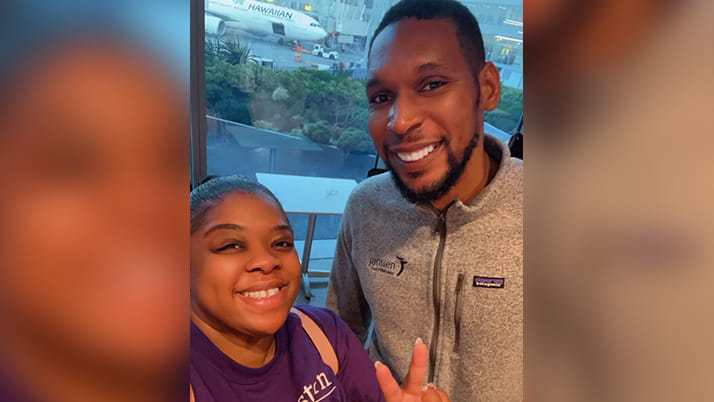 Kellogg student LaVincia Porch smiles for a selfie with a classmate