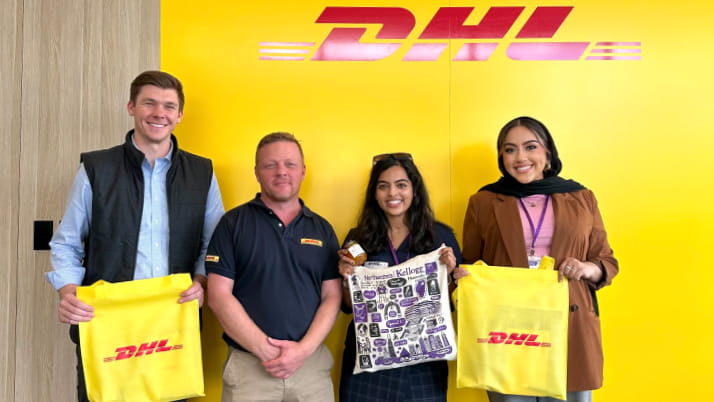Two men and two women at the DHL Supply Chain in Auckland.