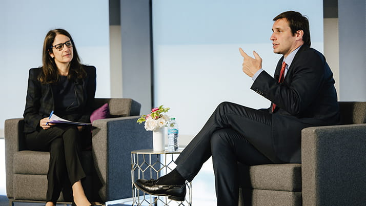 Professor Carola Frydman and Ed Brenninkmeyer particiapte in a fireside chat on the topic of family enterprises at the Ward Center re:connect conference.