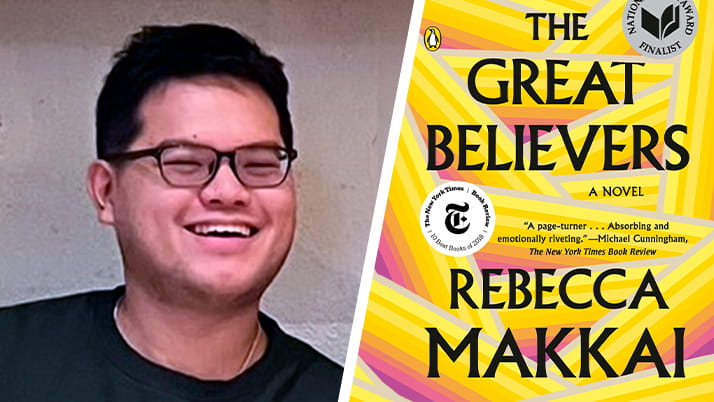 Al, an MBA student, next to his PRIDE media pick