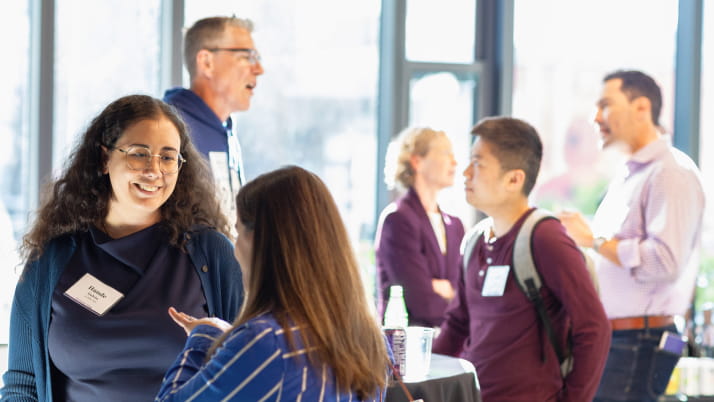 A group of people networking with each other
