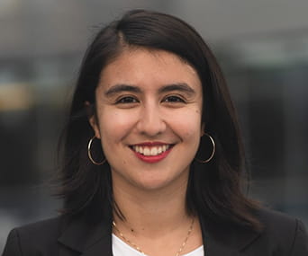 Woman with dark shoulder-length hair