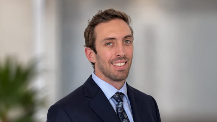 A white man dressed in a business attire.