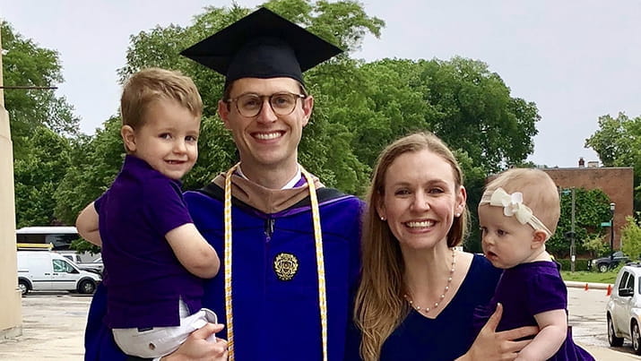 Rob Pothier with his wife and two children on graduation day