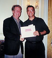 Stan Mandell '66 (L) presents award to Howard Green '01