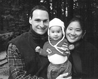 Roman Reznicek '97 and Birdie Chang Reznicek '98 with their daughter, Robyn Kaia Reznicek