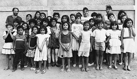 Kevin Marinacci '96 with some of the Nicaraguan children his organization serves