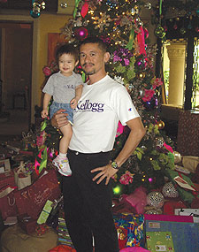 Dennis Valdes '90 with daughter Athena.