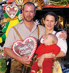 Annette Herz '97, husband Ian Wilcken and son Tobias celebrate in costume at Oktoberfest.