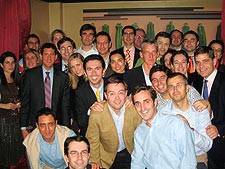 The Kellogg Alumni Club of Madrid shows off its team spirit at the club's annual holiday meeting.
