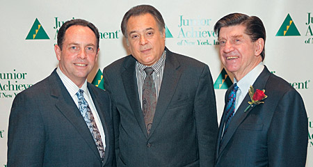 Chris Andersen '62, right, with JANY President Douglas Schallau, left, and JANY Treasurer H. Ronald Weissman