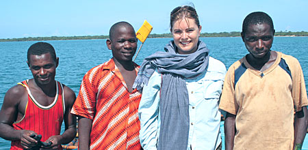 Jamee Field with community members in Tanzania