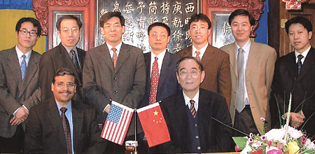 Dean Jain with Guanghua dean and member of faculty