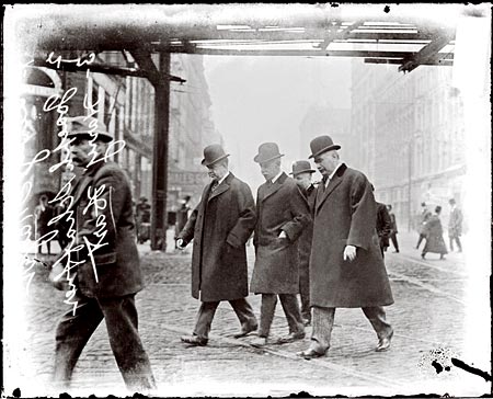 Attorney Levy Mayer, Joseph Schaffner and Harry Hart walking across a Chicago street in 1910